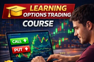 Student learning options trading course with charts on laptop