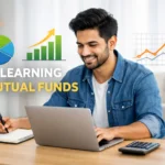 First-time Indian investor learning mutual funds on a laptop with simple growth charts and notebook on desk.