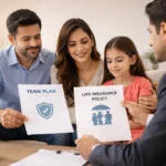 Indian family comparing term insurance and life insurance policies with advisor at home.